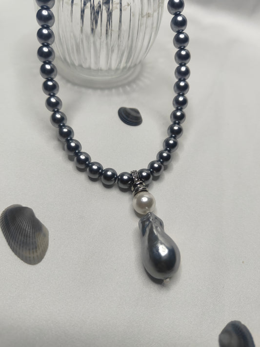 PSP006	Lunar Grace- Metallic grey single strand shell pearl necklace with Baroque pendant