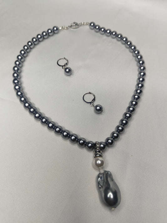 PSP006	Lunar Grace- Metallic grey single strand shell pearl necklace with Baroque pendant
